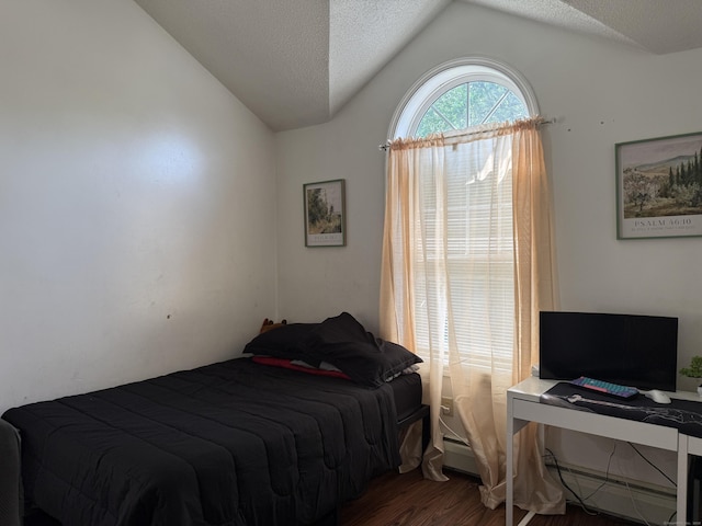 337 Zion St, Hartford, CT 06106 - bedroom featuring vaulted ceiling, wood finished floors, a textured ceiling, and an office area