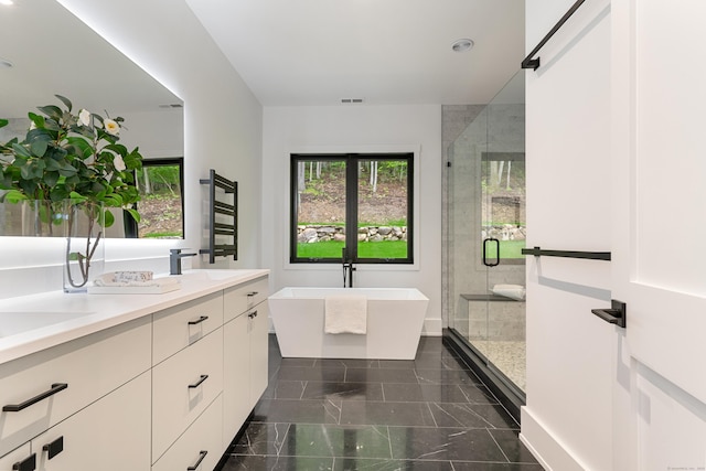 22 Limekiln Rd, Redding, CT 06896 - full bathroom featuring a stall shower, a freestanding tub, double vanity, and recessed lighting