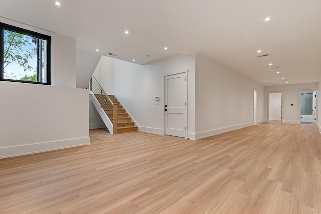 22 Limekiln Rd, Redding, CT 06896 - unfurnished living room with stairs, light wood-style flooring, recessed lighting, and baseboards