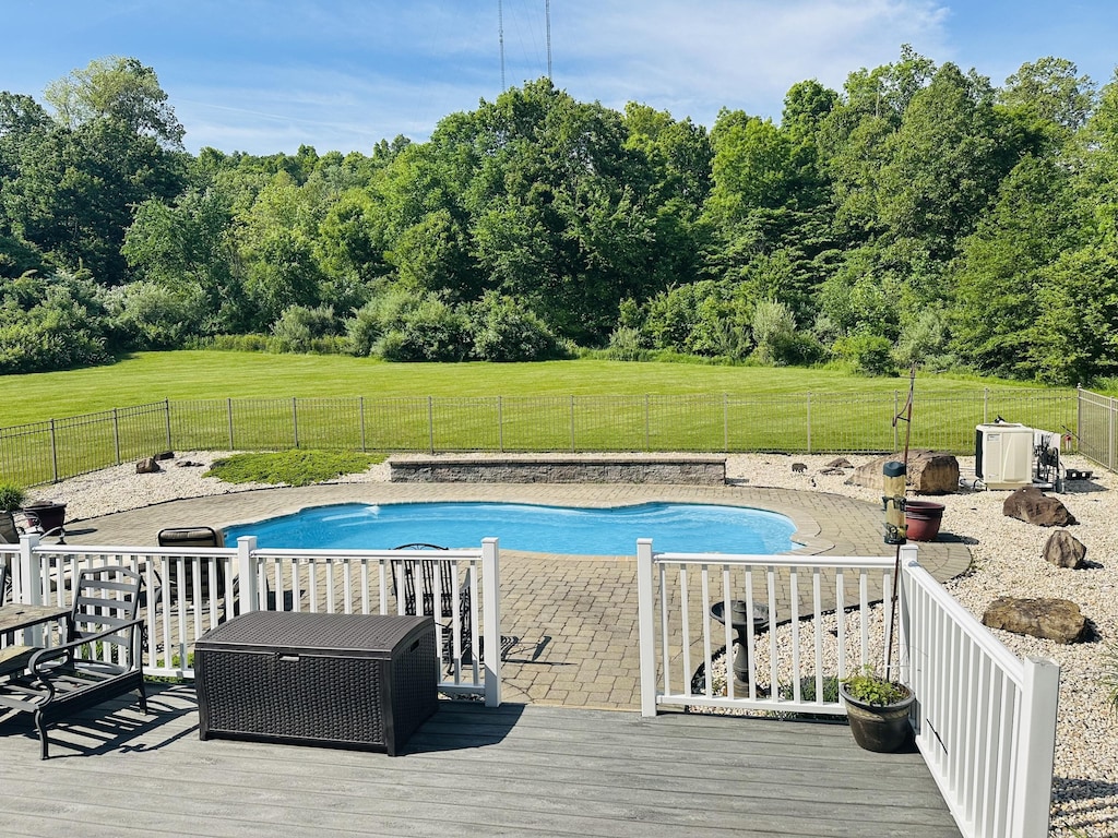7 Trumbull Ln, Farmington, CT 06032 - view of pool with a wooden deck
