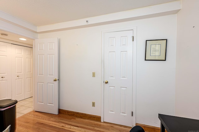2 Mansfield Grove Rd Apt 160, East Haven, CT 06512 - bedroom with light wood-style floors and baseboards