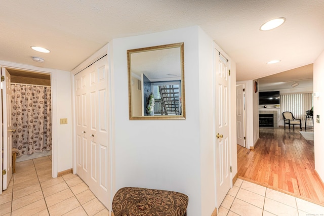 2 Mansfield Grove Rd Apt 160, East Haven, CT 06512 - hall with light tile patterned floors, recessed lighting, and baseboards