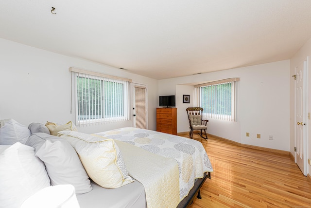 2 Mansfield Grove Rd Apt 160, East Haven, CT 06512 - bedroom with light wood-style flooring and baseboards