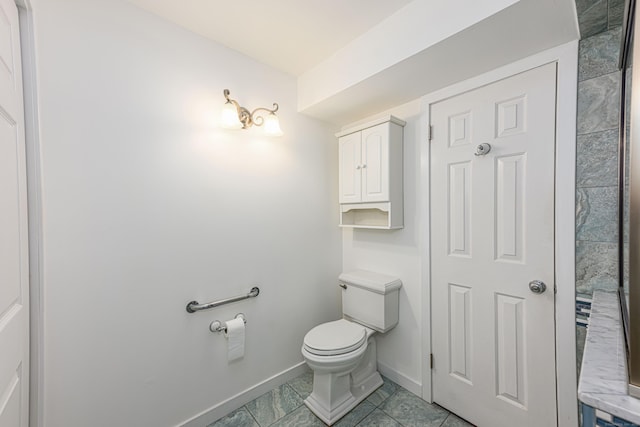 2 Mansfield Grove Rd Apt 160, East Haven, CT 06512 - bathroom with toilet, baseboards, and tile patterned flooring