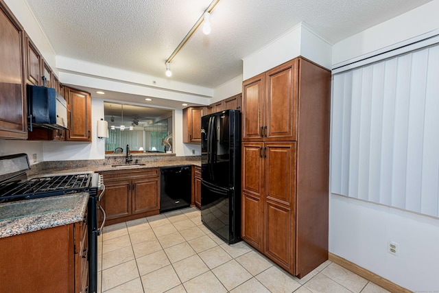 2 Mansfield Grove Rd Apt 160, East Haven, CT 06512 - kitchen featuring black appliances, a textured ceiling, light tile patterned flooring, a sink, and brown cabinetry