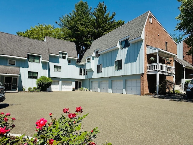30 Hills Ln Unit 30, Norwalk, CT 06880 - view of property featuring an attached garage