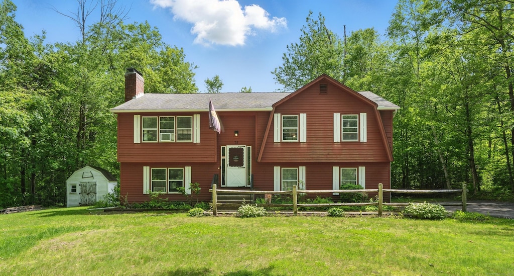 75 Mountain Rd, Hartland, CT 06027 - bi-level home featuring a chimney