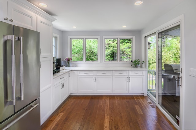156 Main St, Ridgefield, CT 06877 - kitchen with freestanding refrigerator, plenty of natural light, light countertops, and recessed lighting