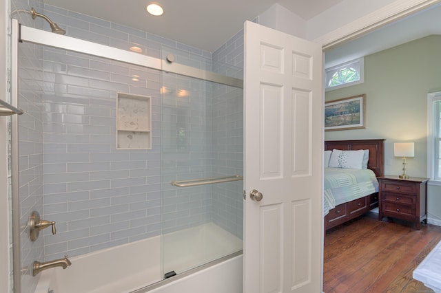 156 Main St, Ridgefield, CT 06877 - bathroom featuring bath / shower combo with glass door, wood finished floors, ensuite bathroom, and recessed lighting