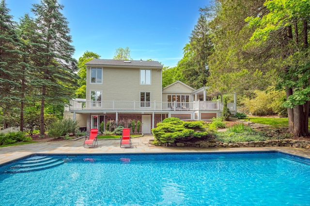 156 Main St, Ridgefield, CT 06877 - outdoor pool featuring a patio area and a wooden deck