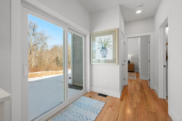 7 Ivy Hill Rd, Waterford, CT 06385 - doorway featuring light wood finished floors and baseboards