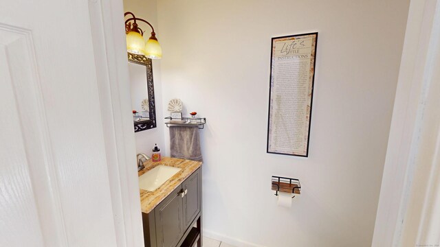 77 Bassett Rd, North Haven, CT 06473 - bathroom with vanity and tile patterned floors