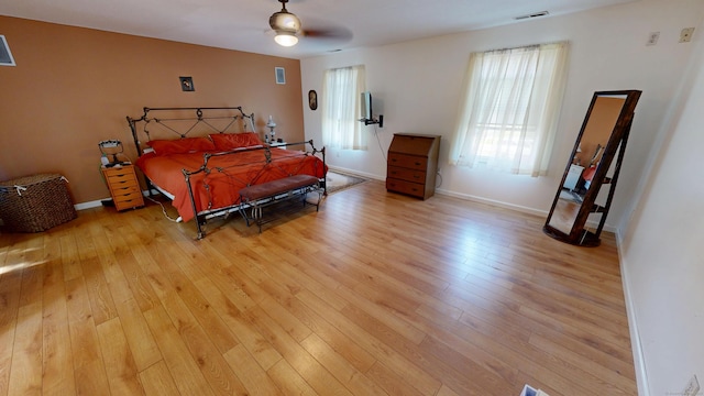 77 Bassett Rd, North Haven, CT 06473 - bedroom featuring light wood finished floors, baseboards, and a ceiling fan