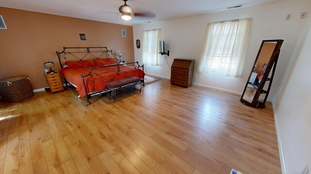 77 Bassett Rd, North Haven, CT 06473 - bedroom featuring light wood finished floors, baseboards, and a ceiling fan