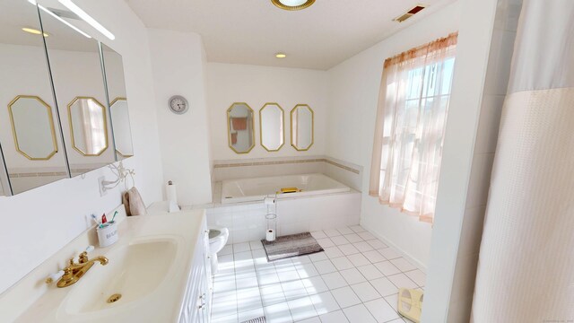77 Bassett Rd, North Haven, CT 06473 - bathroom featuring tile patterned flooring, a bath, toilet, and vanity
