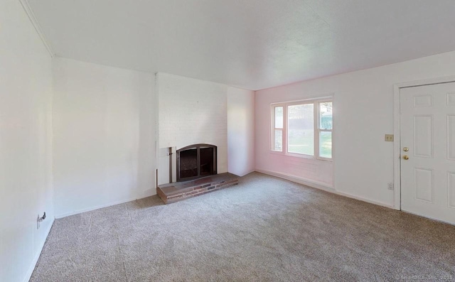 77 Bassett Rd, North Haven, CT 06473 - unfurnished living room with a fireplace and carpet floors