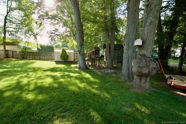 77 Bassett Rd, North Haven, CT 06473 - view of yard with a playground