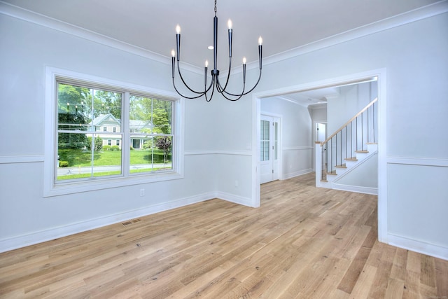 59 Thornhill Rd, Fairfield, CT 06824 - unfurnished dining area with a chandelier, stairway, light wood finished floors, ornamental molding, and baseboards