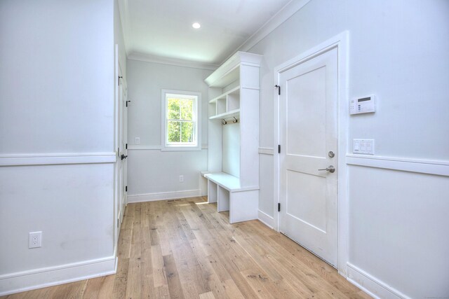 59 Thornhill Rd, Fairfield, CT 06824 - mudroom with ornamental molding, light wood-style flooring, baseboards, and recessed lighting