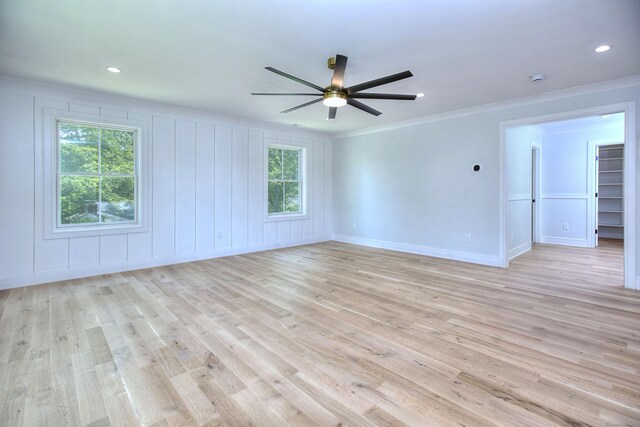 59 Thornhill Rd, Fairfield, CT 06824 - spare room with crown molding, light wood finished floors, a ceiling fan, baseboards, and recessed lighting