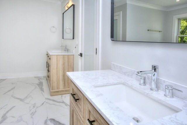 59 Thornhill Rd, Fairfield, CT 06824 - full bathroom with two vanities, marble finish flooring, and baseboards