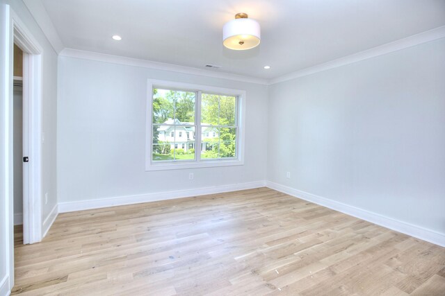 59 Thornhill Rd, Fairfield, CT 06824 - empty room featuring crown molding, baseboards, light wood-style floors, and recessed lighting
