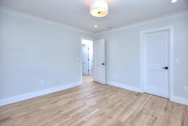 59 Thornhill Rd, Fairfield, CT 06824 - empty room with ornamental molding, baseboards, light wood-style floors, and recessed lighting