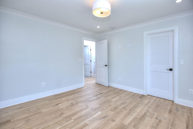 59 Thornhill Rd, Fairfield, CT 06824 - spare room featuring ornamental molding, light wood-type flooring, and recessed lighting