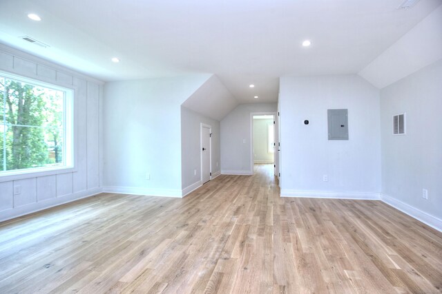 59 Thornhill Rd, Fairfield, CT 06824 - bonus room featuring light wood finished floors, vaulted ceiling, electric panel, baseboards, and recessed lighting