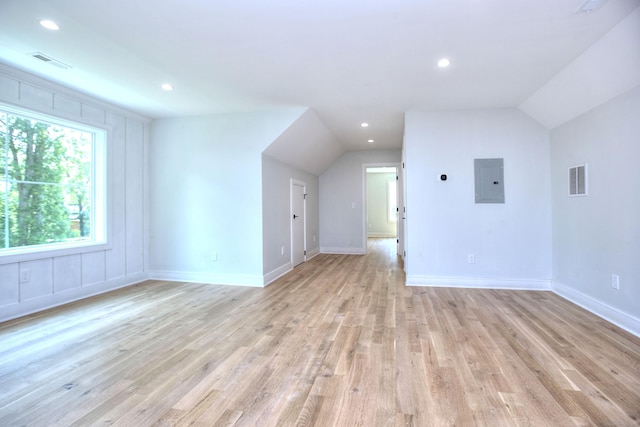 59 Thornhill Rd, Fairfield, CT 06824 - additional living space with light wood finished floors, vaulted ceiling, electric panel, and recessed lighting