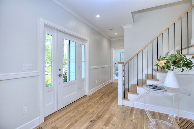 59 Thornhill Rd, Fairfield, CT 06824 - foyer featuring wood finished floors, crown molding, stairs, and recessed lighting
