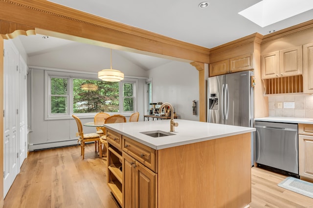 15 Hallsey Ln, Woodbridge, CT 06525 - kitchen with stainless steel appliances, a skylight, a baseboard heating unit, vaulted ceiling, and light wood-type flooring