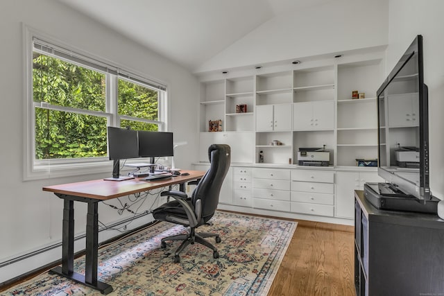 15 Hallsey Ln, Woodbridge, CT 06525 - home office with vaulted ceiling and light wood-style flooring