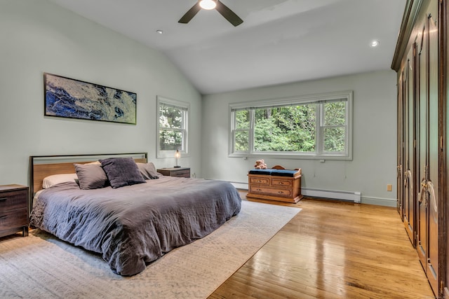 15 Hallsey Ln, Woodbridge, CT 06525 - bedroom with baseboard heating, light wood-type flooring, vaulted ceiling, a ceiling fan, and recessed lighting