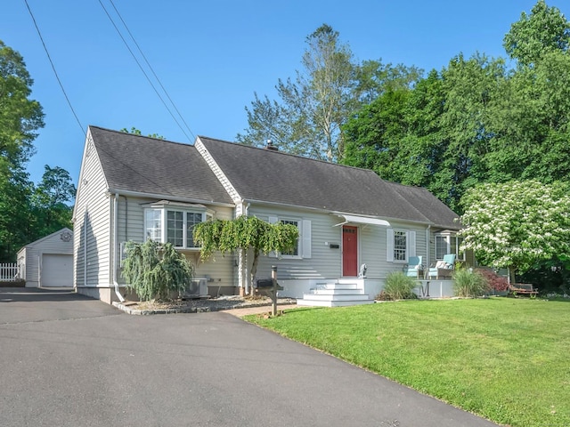 6 Victoria Rd, Portland, CT 06480 - cape cod home with an outbuilding, a garage, a front yard, and a shingled roof