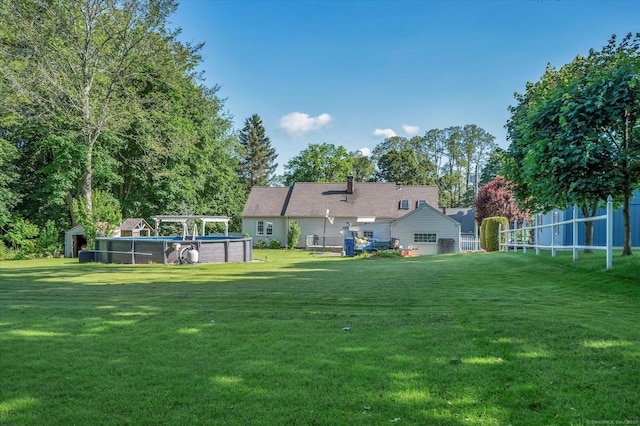 6 Victoria Rd, Portland, CT 06480 - back of house featuring an outdoor pool and a storage unit