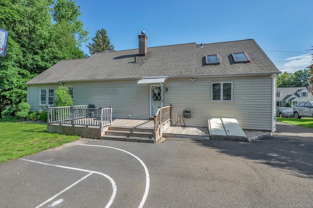 6 Victoria Rd, Portland, CT 06480 - back of house featuring a deck, a chimney, a lawn, and a shingled roof