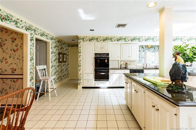 1493 Bucks Hill Rd, Southbury, CT 06488 - kitchen featuring black appliances, wallpapered walls, dark countertops, light tile patterned floors, and crown molding