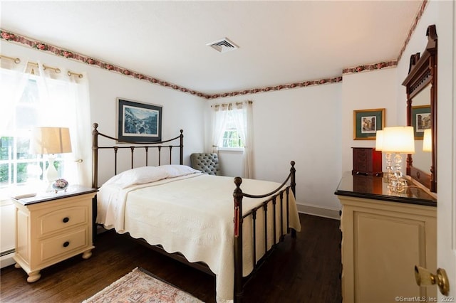 1493 Bucks Hill Rd, Southbury, CT 06488 - bedroom with dark wood-style floors and a baseboard heating unit