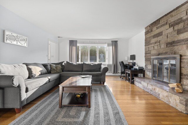 7 Lorma Ave, Trumbull, CT 06611 - living room featuring a large fireplace and wood finished floors