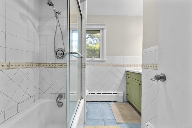 7 Lorma Ave, Trumbull, CT 06611 - bathroom with tile walls, vanity, tile patterned floors, shower / bath combination, and a baseboard radiator