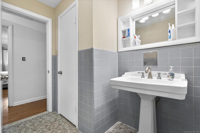 7 Lorma Ave, Trumbull, CT 06611 - bathroom featuring tile walls and a wainscoted wall
