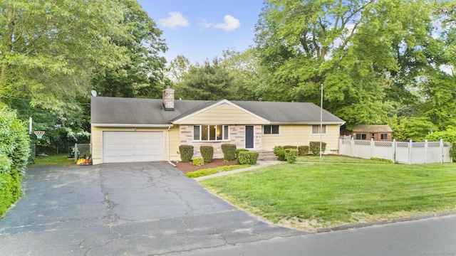 7 Lorma Ave, Trumbull, CT 06611 - single story home featuring a garage, a chimney, and driveway