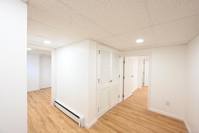 34 River St, East Haven, CT 06512 - hallway with baseboard heating, light wood finished floors, recessed lighting, a drop ceiling, and baseboards
