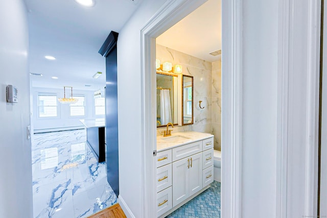 34 River St, East Haven, CT 06512 - full bath with vanity, toilet, a baseboard radiator, and recessed lighting