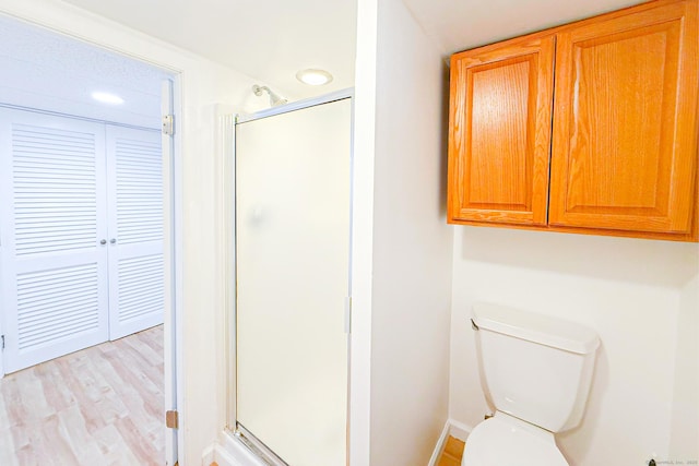 34 River St, East Haven, CT 06512 - full bath featuring a stall shower, toilet, baseboards, recessed lighting, and wood finished floors