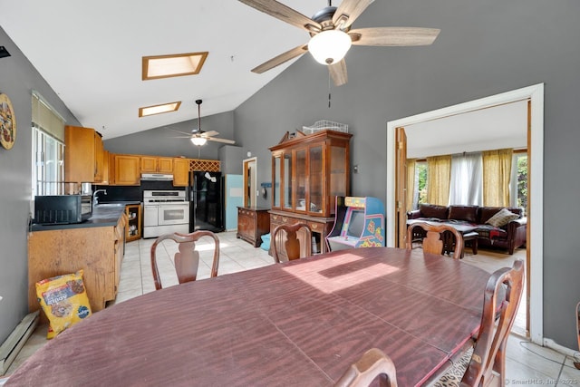 18 Robbie Rd, East Haddam, CT 06469 - dining area with ceiling fan, healthy amount of natural light, a baseboard radiator, light tile patterned floors, and high vaulted ceiling