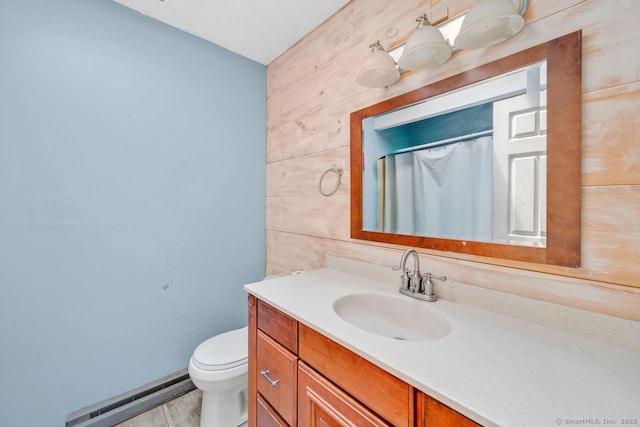 18 Robbie Rd, East Haddam, CT 06469 - full bath featuring a baseboard heating unit, vanity, toilet, and curtained shower