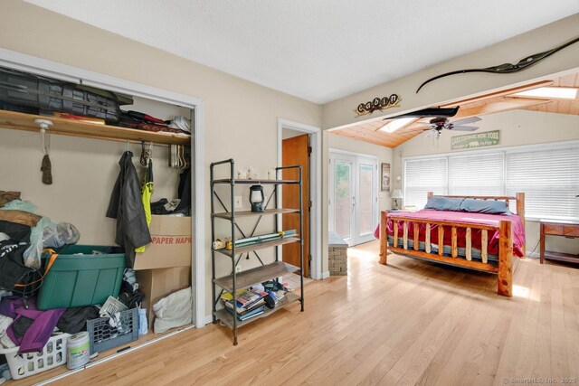 18 Robbie Rd, East Haddam, CT 06469 - bedroom featuring wood finished floors, lofted ceiling, a closet, and ceiling fan