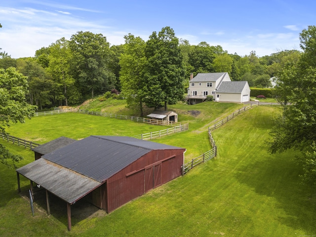 aerial view of sparsely populated area featuring a pastoral area